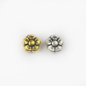 Gold and silver flower spacer beads with raised petal detail for jewellery making and craft projects
