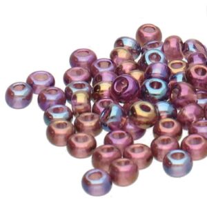 Size 11/0 Preciosa Seed Beads - Amethyst AB, a multicoloured pink, blue and gold bead