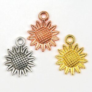 Sunflower Charms available in 3 rustic metal colours, with a hole at the top of the charm.
