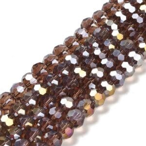 8mm faceted crystal round bead in a mysterious transparent brown colour with white shimmers from the light.