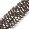 8mm faceted crystal round bead in a mysterious transparent grey colour with white shimmers from the light.