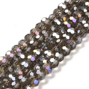 8mm faceted crystal round bead in a mysterious transparent grey colour with white shimmers from the light.