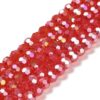 8mm faceted crystal round bead in a vibrant transparent red colour with white shimmers from the light.