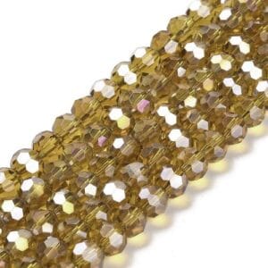 8mm faceted crystal round bead in a vibrant transparent gold colour with white shimmers from the light.