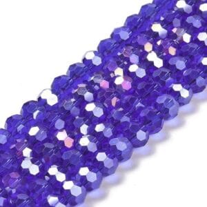 8mm faceted crystal round bead in a vibrant transparent blue colour with white shimmers from the light.