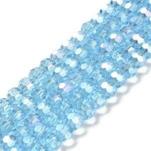 8mm faceted crystal round bead in a vibrant transparent blue colour with white shimmers from the light.