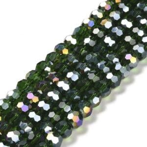 8mm faceted crystal round bead in a vibrant transparent green colour with white shimmers from the light.