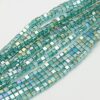 Strand of 4mm Glass Cubes in Green AB, the aurora borealis finish gives them a rainbow like shimmer in the light.