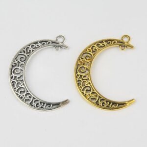 Decorative Moon Charms in both gold and silver. The charms have decorative filigree patterns in the centre of them.