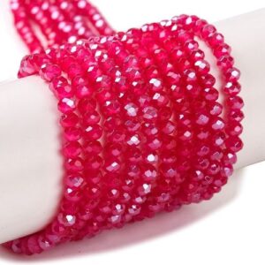 Fuchsia Crystal Rondelle beads with an Aurora Borealis finish. gives them a colourful glimmer in the light.