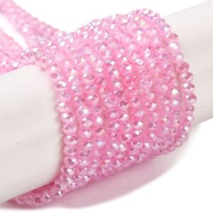 Pink Crystal Rondelle beads with an Aurora Borealis finish. gives them a colourful glimmer in the light.