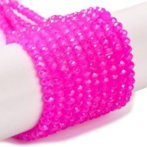 Hot Pink Crystal Rondelle beads with an Aurora Borealis finish. gives them a colourful glimmer in the light.