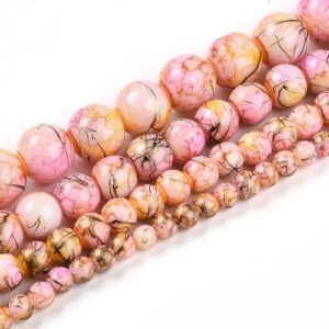 Marbled Glass Beads - Peach Crush. The beads come in 4 sizes as shown in the picture and are a mixture of yellow, orange and pink with golden streaks throughout.