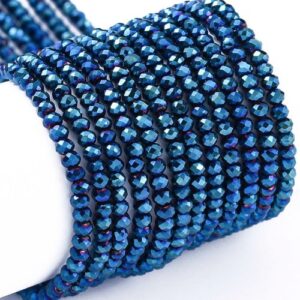 Micro Crystal Bead - Metallic Teal they are a very small crystal rondelle. This metallic blue bead has hints of purple throughout the bead.