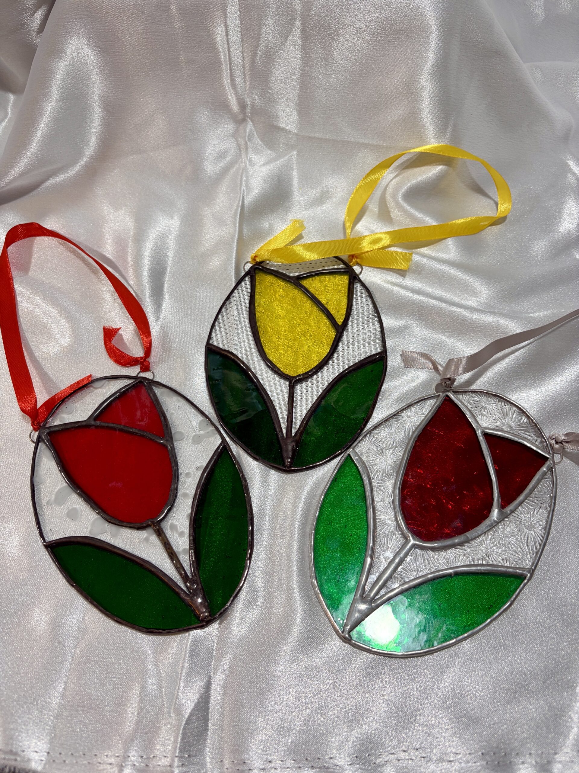 Art Deco-inspired stained glass tulip light catcher handmade using the Tiffany copper foiling method
