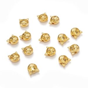 Gold: Gold cat head spacer beads with raised ears and engraved facial features for jewellery making.