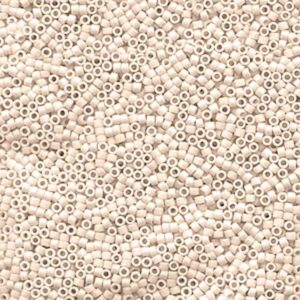 Close-up of Miyuki Delica DB1581 Matte Opaque Pear seed beads in a soft pale neutral shade