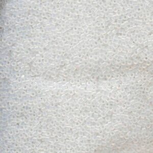 Close-up of Miyuki Delica DB220 White Opal seed beads with a soft milky translucent finish