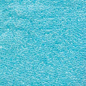 Close-up of Miyuki Delica DB239 Crystal Light Aquamarine Lined seed beads with a fresh blue finish