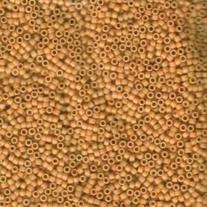 Close-up of Miyuki Delica DB389 Matte Opaque Light Terracotta seed beads in a warm clay shade