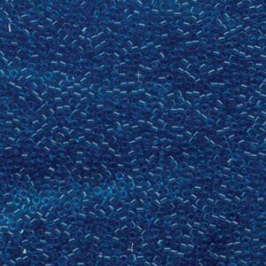 Close-up of Miyuki Delica DB714 Transparent Aquamarine seed beads in a deep blue-aqua shade
