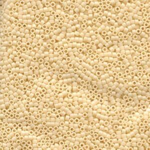 Close-up of Miyuki Delica DB732 Opaque Cream seed beads in a soft neutral shade