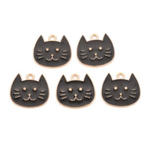 Black enamel cat head charms with gold-tone outlines, facial details and top loops for jewellery making.