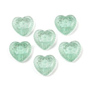 Six mint green embossed floral heart-shaped glass beads for jewellery making, measuring approximately 16mm x 18mm.