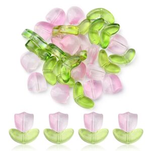 Pink glass tulip flower beads with green leaves and stems for beaded floral jewellery and craft projects.