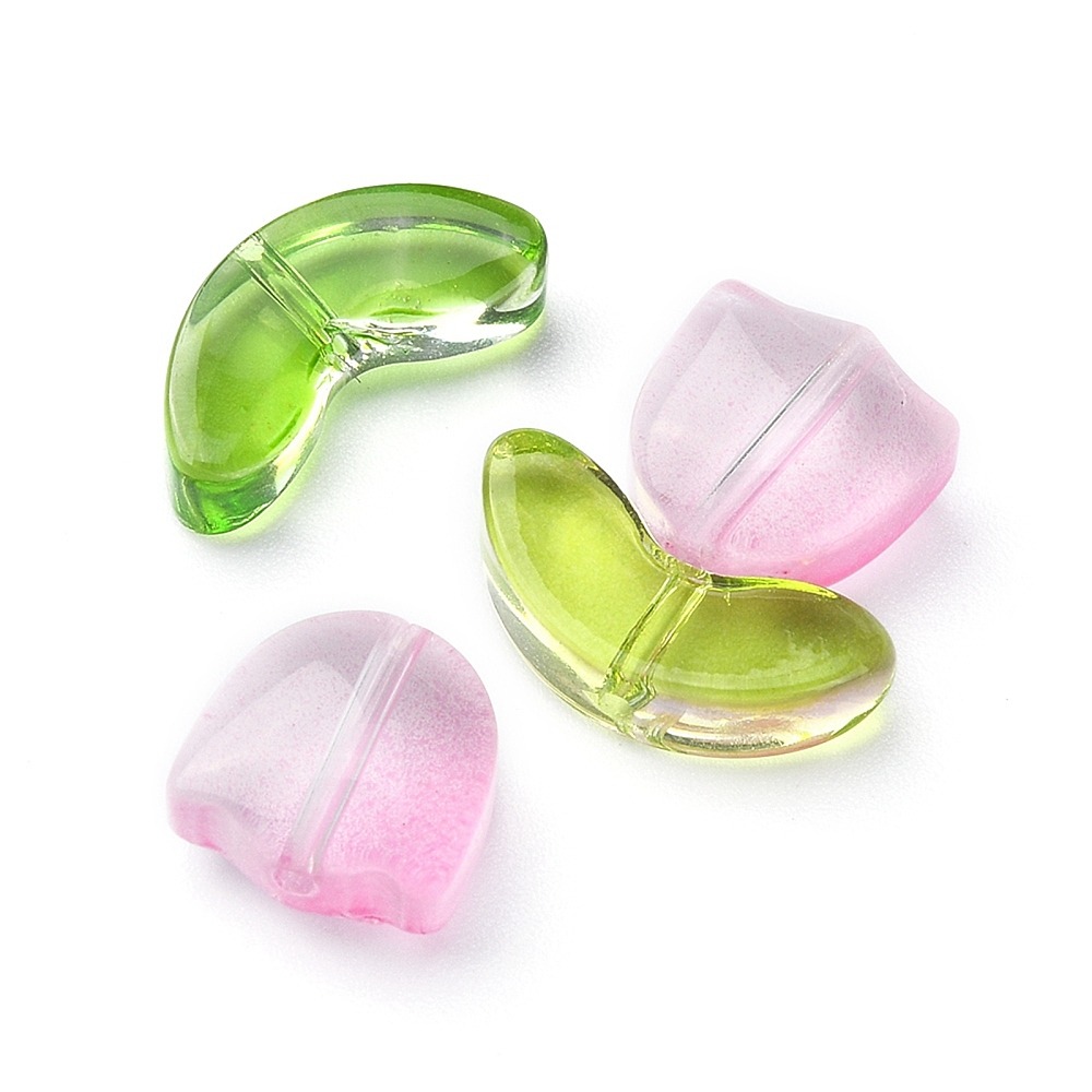 A close up of the Glass Pink glass tulip flower beads with green leaves and stems for beaded floral jewellery and craft projects.