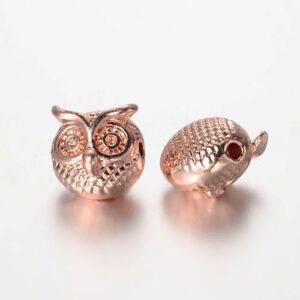 Rose gold: Rose gold owl spacer beads with large eyes, feather detail and a polished finish.