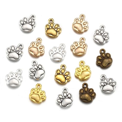 Mixed metal paw print charms in silver, gold, rose gold and bronze finishes for jewellery making.