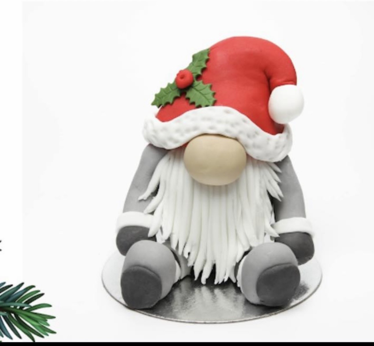 Handmade Christmas Gonk sugarcraft cake topper created around a Terry's Chocolate Orange at Riverside Beads & Crafts workshop.