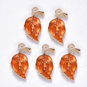 Orange enamel autumn leaf charms with a light gold finish from Riverside Beads, sold in packs of five.
