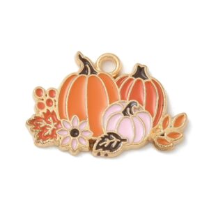 Pumpkin Patch Charm with three pumpkins, flowers and leaves in warm autumn colours from Riverside Beads.